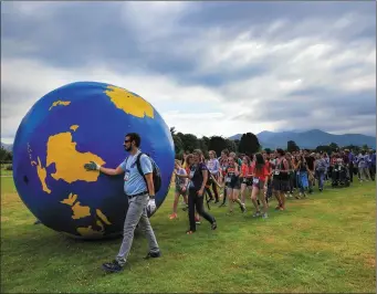  ?? Photo by Valerie O’Sullivan. ?? The GLOBE parade of nations rolling through KIllarney National Park.