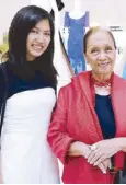  ??  ?? Sonia Olivares and grand daughter Miuccia pose in front of Sonia’s Valera terno