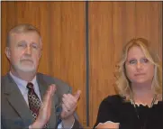  ?? MACOMB DAILY FILE PHOTO ?? Acting Macomb County Clerk Kathy Smith with her brother, Michael, at the meeting earlier this year where she was appointed.