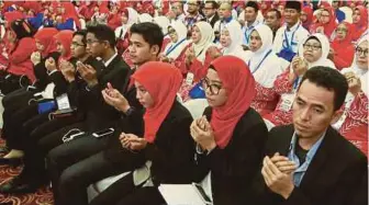  ?? [FOTO SAIRIEN NAFIS/BH] ?? Antara pelajar universiti yang menghadiri Konvensyen Pemerkasaa­n Agenda Ummah 3.0, di PWTC, semalam.