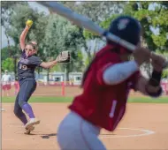 ?? File photo ?? (Left) Valencia’s Shea O’Leary throws a pitch in a game against Hart this season. (Above) Ally Shipman skies one to right in a 1-0 victory over Golden Valley. O’Leary was named the Foothill League Pitcher of the Year and Shipman the Player of the Year.