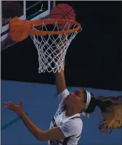  ?? CHARLIE RIEDE – THE ASSOCIATED PRESS ?? South Carolina’s Victaria Saxton goes up for two of her 20 points in Sunday’s tournament game against Mercer.