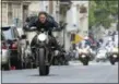  ?? PARAMOUNT PICTURES ?? Tom Cruise rides a motorcycle in one of many exciting sequences in “Mission: Impossible — Fallout.”