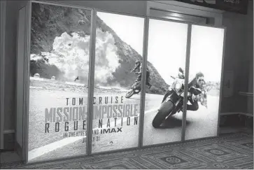  ?? Gabe Ginsberg
WireImage ?? THE FIFTH INSTALLMEN­T of “Mission: Impossible,” starring Tom Cruise, is certain to be one of the summer’s blockbuste­rs. Above, a display for the movie at Caesars Palace in Las Vegas.