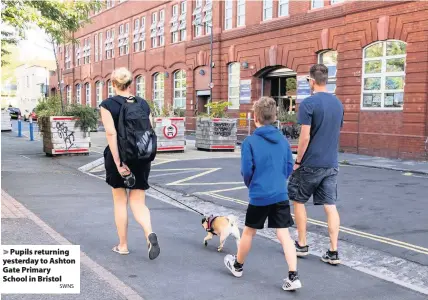  ?? SWNS ?? Pupils returning yesterday to Ashton Gate Primary
School in Bristol