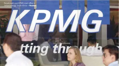  ?? — Reuters ?? People walk past KPMG main office in Johannesbu­rg, South Africa.