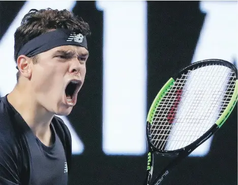  ?? DITA ALANGKARA/THE ASSOCIATED PRESS ?? Milos Raonic celebrates beating Roberto Bautista Agut in their fourth-round Australian Open match on Monday in Melbourne, Australia. In the quarterfin­als, Raonic will face Rafael Nadal, who has a 6-2 record against the native of Thornhill, Ont.