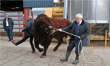  ??  ?? Boris Johnson talked up his ‘powers of persuasion’ on a visit to a farm in Aberdeensh­ire. Photograph: Reuters