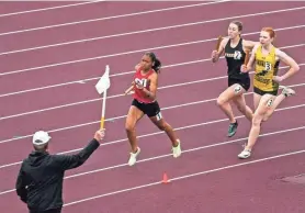  ?? EBONY COX / MILWAUKEE JOURNAL SENTINEL ?? Shorewood freshman Kaymin Philips (1) competes in the 4x400 meter relay during the Division 2 WIAA state track and field meet Saturday at Veterans Memorial Stadium Complex in La Crosse.