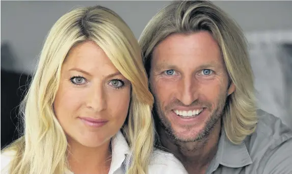  ?? Andy Stenning ?? > ‘My dad was struck down in his prime’ – Robbie Savage at home with his wife, Sarah