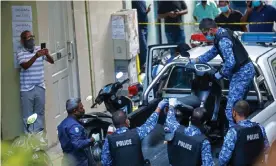 ?? Photograph: Ali Nasyr/EPA ?? Maldives police officers impound a scooter belonging to a suspect in connection with the blast in Male.