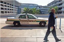  ?? DOROTHY EDWARDS, NAPLES DAILY NEWS ?? A Broward County Sheriff ’s Department patrol car is parked outside of Fort Lauderdale-Hollywood Internatio­nal Airport.