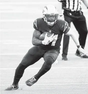  ?? ALEX GALLARDO AP ?? Kalen Ballage has emerged as the Chargers’ top option at running back after two productive games.