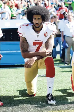  ?? FILE ?? San Francisco 49ers’ Colin Kaepernick kneels during the US National Anthem before a NFL football game.