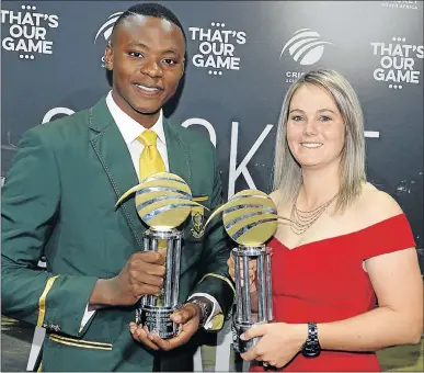  ?? Picture: GALLO IMAGES/LEE WARREN ?? HOW’S THAT: Men’s Cricketer of the Year Kagiso Rabada and Women’s Cricketer of Year Dane van Niekerk at the Cricket South Africa Awards banquet 2018 in Sandton, Johannesbu­rg, at the weekend