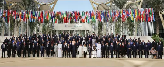 ?? ?? PM Modi and wseveral world leaders pose for a commemotiv­e photo at COP 28 in Dubai. All pics on this page: PIB/India