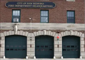 ?? PHOTO BY PAUL CONNORS — MEDIA NEWS GROUP/BOSTON HERALD ?? The facade of the New Bedford Fire Headquarte­rs is shown after police shot and killed former interim Fire Chief Paul Coderre.