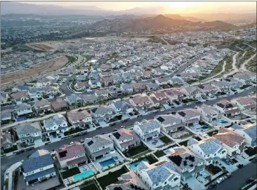  ?? MARIO TAMA — GETTY IMAGES ?? Sales of SoCal homes, like these in Santa Clarita, totaled 13,051in September, the second-fewest for the month since 1988.