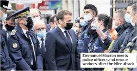  ??  ?? Emmanuel Macron meets police officers and rescue workers after the Nice attack