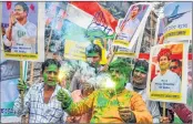  ?? —PTI ?? Congress workers celebrate as the party puts up a good show in the three state Assembly elections, in Kolkata on Tuesday.