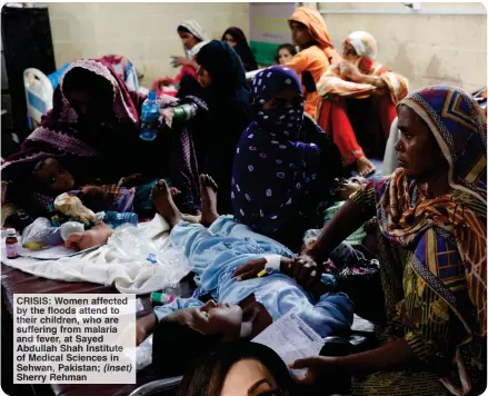  ?? ?? CRISIS: Women affected by the floods attend to their children, who are suffering from malaria and fever, at Sayed Abdullah Shah Institute of Medical Sciences in Sehwan, Pakistan; (inset) Sherry Rehman