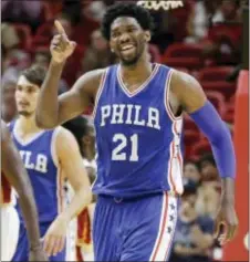  ?? THE ASSOCIATED PRESS FILE ?? Sixers center Joel Embiid, happy and healthy in this preseason game against Miami, probably wasn’t expecting to fall back into the category of team china doll after flashing his dominant form for a couple of months in the season’s first half.