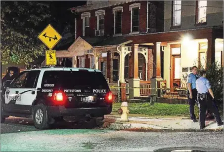  ?? DIGITAL FIRST MEDIA FILE PHOTO ?? Police at the scene of the Saturday stabbing of Anthony Levan at the corner of South and South Washington streets.