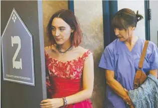  ?? A24 FILMS ?? Saoirse Ronan, left, as Lady Bird, and Laurie Metcalf as her mother in “Lady Bird.”