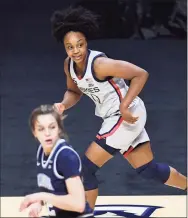  ?? Jessica Hill / Associated Press ?? UConn’s Christyn Williams watches her basket go in during the second half of a Big East semifinal win over Villanova earlier this month.