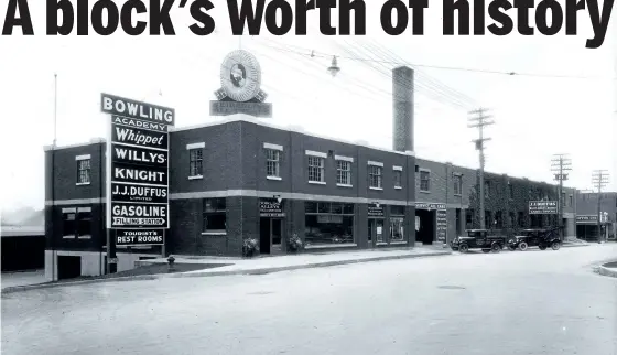  ?? SPECIAL TO THE EXAMINER ?? The Duffus garage building, built roughly on the site of the 1819 Adam Scott mill at the southeast corner of Water and Charlotte streets, later became a bowling alley, restaurant­s and the home of the school board before it was torn down in 1996 to make...