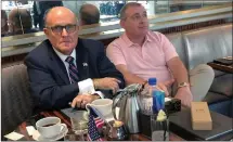  ??  ?? Giuliani and Parnas at Trump’s Washington, D.C., hotel