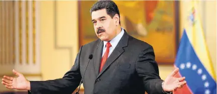  ?? MARCO BELLO/REUTERS-15/2/2018 ?? Bolso vazio. Nicolás Maduro em conferênci­a em Caracas: diplomatas do país enfrentam dificuldad­es econômicas