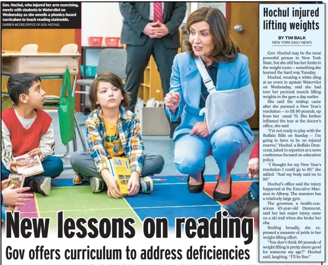  ?? DARREN MCGEE/OFFICE OF GOV. HOCHUL ?? Gov. Hochul, who injured her arm exercising, meets with students in Watervliet on Wednesday as she unveils a phonics-based curriculum to teach reading statewide.