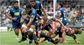  ?? GETTY IMAGES ?? Blues No 8 Akira Ioane proves a handful for the Sunwolves defence in Tokyo yesterday.