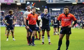  ?? Photograph: Jane Barlow/PA ?? Scotland's Finn Russell (second right) waits for the decision over their late try. The referee said the ball was held up and TMO backed him up.