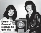  ?? ?? Donny Osmond receives his gold disc