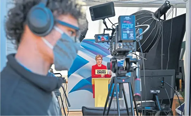  ??  ?? IN THE FRAME: Nicola Sturgeon launched the SNP election manifesto yesterday, describing it as ‘optimistic and transforma­tional’.