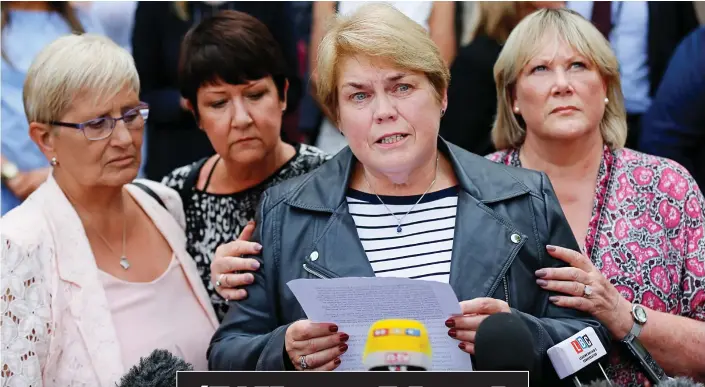  ??  ?? Venting her anger: Patricia Welch outside court yesterday, calling for a public inquiry into the scandal