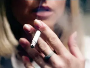  ??  ?? Toxic cloud...smokers dodge the menthol ban by adapting ordinary cigarettes