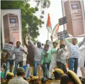  ?? — PTI ?? Youth Congress activists stage a demonstrat­ion outside Reserve Bank of India office on the third anniversar­y of demonetisa­tion in New Delhi on Friday.