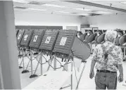  ?? Michael Ciaglo / Houston Chronicle ?? Voters did not turn out in droves for the Democratic and Republican primary runoff elections at the Metropolit­an Multi-Services Center on May 24.