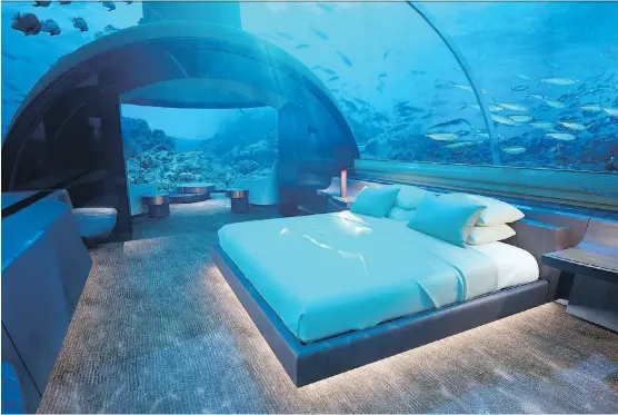  ??  ?? Want to sleep with the fishes? An acrylic dome separates the bedroom from the sea at Conrad Maldives Rangali Island’s luxurious underwater Muraka hotel suite, set to open in November.