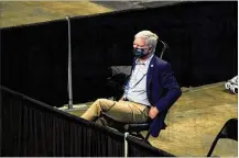  ?? ERIC GAY / AP ?? NCAA President Mark Emmert watches the first half of a women’s basketball game between North Carolina State and South Florida in the second round of the NCAA tournament at the Alamodome in San Antonio on Tuesday.