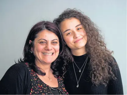  ?? Picture: Fraser Band. ?? Maryam Alhameed, right, with Zabia Shiha Alsammam, a Syrian woman who helps compatriot­s in Perth.