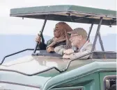  ?? KAREN BALLARD ?? Tanzanian President Samia Suluhu Hassan, left, sits with Peter Greenberg on a safari in Ngorongoro Crater in Tanzania for“The Royal Tour.”