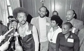  ?? JIM WELLS/AP ?? From left, Betty Shabazz, widow of Malcolm X; Jesse Jackson; Tom Todd, vice president of PUSH; Aretha Franklin; Miriam Makeba; and Louis Stokes, rear right, hold a Soul Picnic for Operation PUSH in New York in 1972.