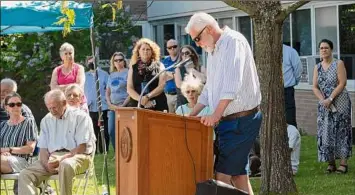  ?? Lori Van Buren / Times Union ?? Meghan Marohn’s brother Peter Naple speaks during the vigil Some expressed their hopes that the gathering would keep Marohn’s name and image circulatin­g so that she could be found.