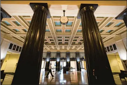  ?? BRIAN CASSELLA/CHICAGO TRIBUNE ?? Above: The original lobby of the Leighton Criminal Court Building.