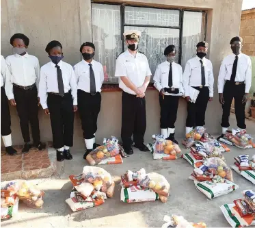  ??  ?? MIKE Taylor, despite his deteriorat­ing heath and family loss of income, has continued to assist in making and delivering food parcels to help TS Springs Sea Cadet families in need.