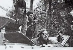  ??  ?? Fidel Castro observes the battle at the Bay of Pigs in April 1961 as the invasion was underway. The attack led Castro to eventually allow Soviet nuclear missiles in Cuba.